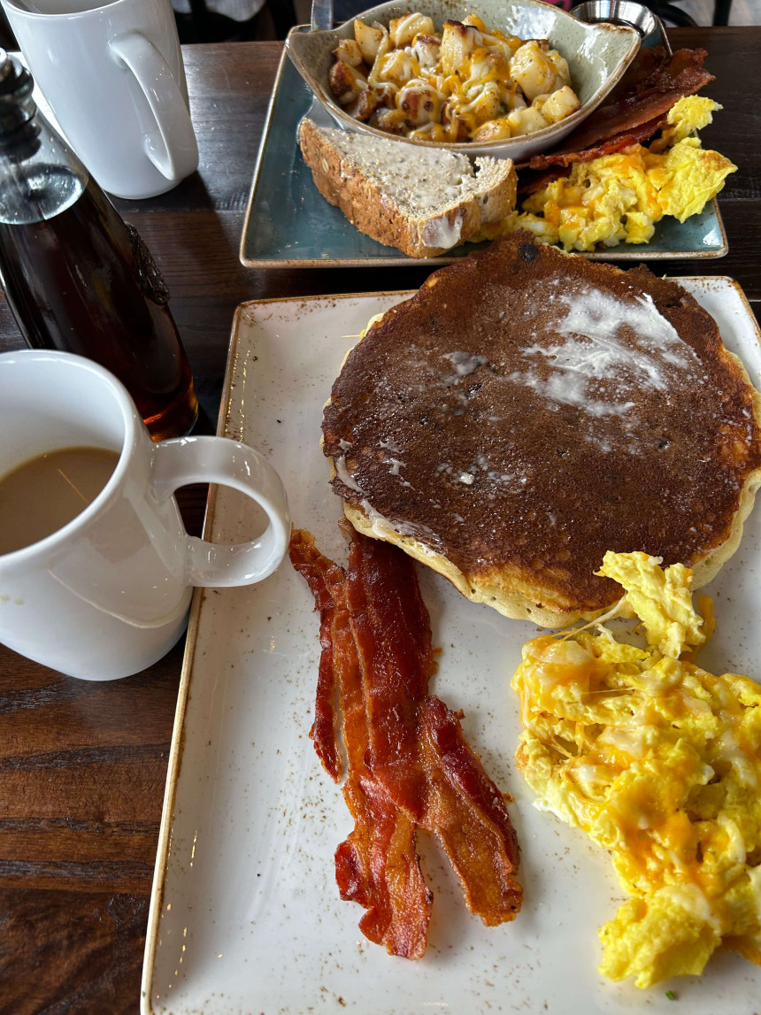 Bacon, eggs, pancakes, and coffee